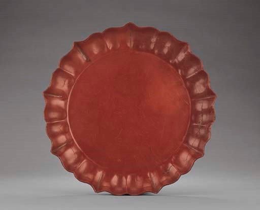 A CINNABAR LACQUER BRACKET-LOBED DISH