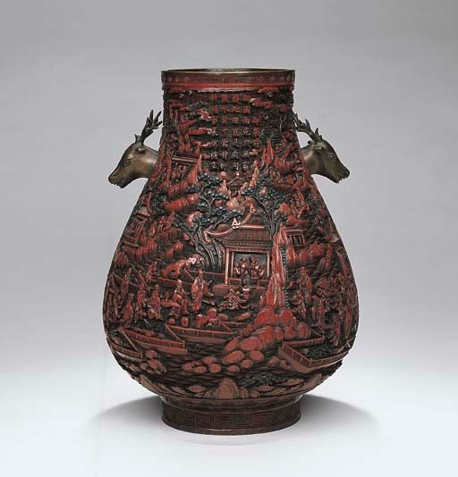 AN UNUSUAL LARGE CARVED CINNABAR LACQUER HU-SHAPED VASE