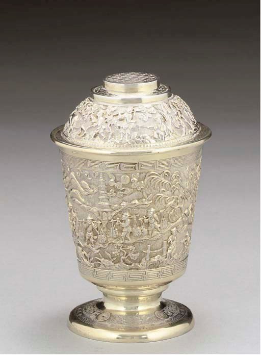 A CHINESE SILVER-GILT COVERED BEAKER,