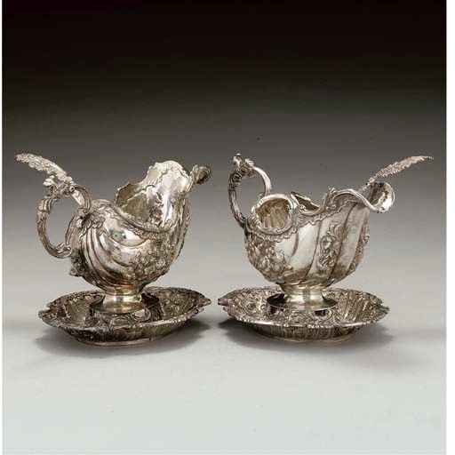 A PAIR OF DUTCH SILVER SAUCEBOATS & STANDS,