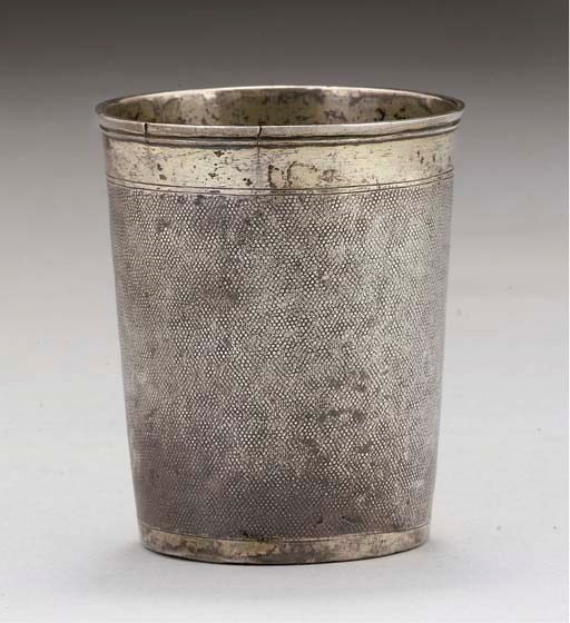 A LATE 17TH/EARLY 18TH CENTURY GERMAN PARCEL-GILT SILVER "SNAKE-SKIN" BEAKER,