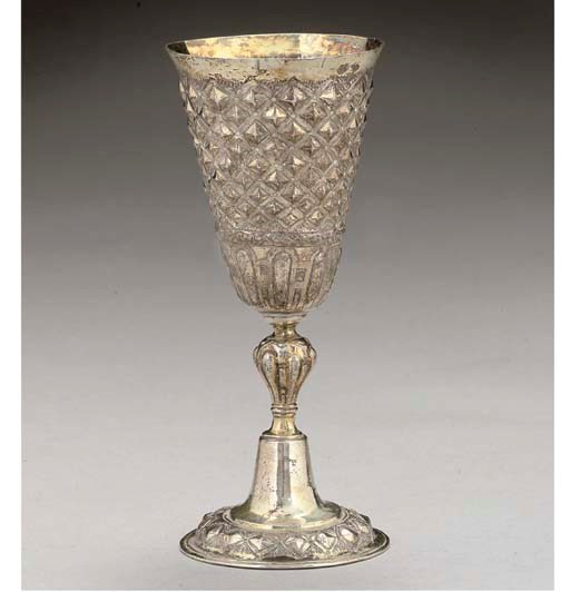 AN EARLY 17TH. CENTURY GERMAN SILVER-GILT GOBLET,