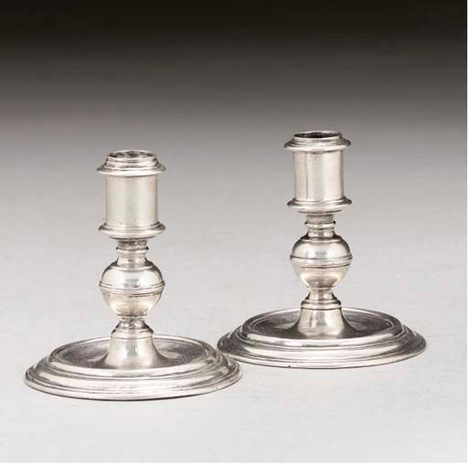 A PAIR OF EARLY 18TH CENTURY MALTESE SILVER TRAVELLING OR DRESSING TABLE CANDLESTICKS,