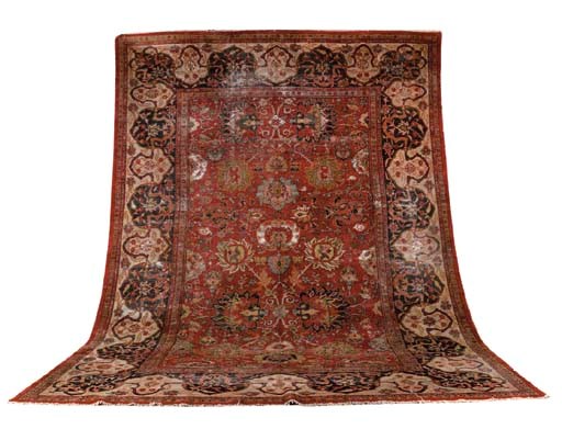 AN ANTIQUE MAHAL CARPET
