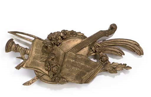 A FRENCH GILTWOOD MUSICAL TROPHY