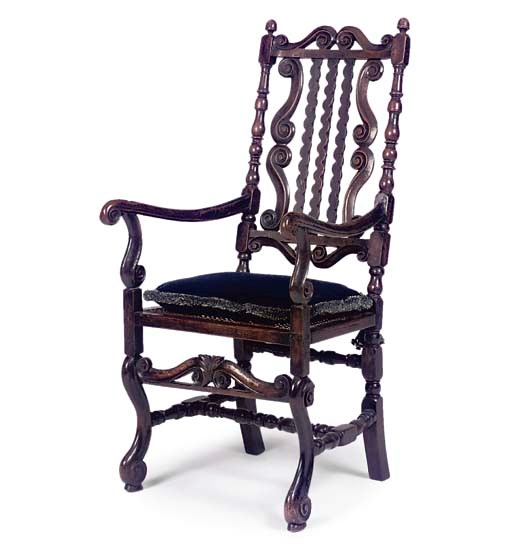 A FRENCH WALNUT ARMCHAIR