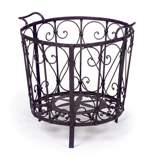 A WROUGHT IRON LOG BASKET