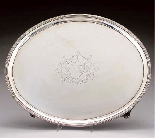 A GEORGE III SILVER OVAL SALVER,