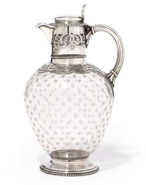 A VICTORIAN SILVER-MOUNTED ENGRAVED GLASS CLARET JUG