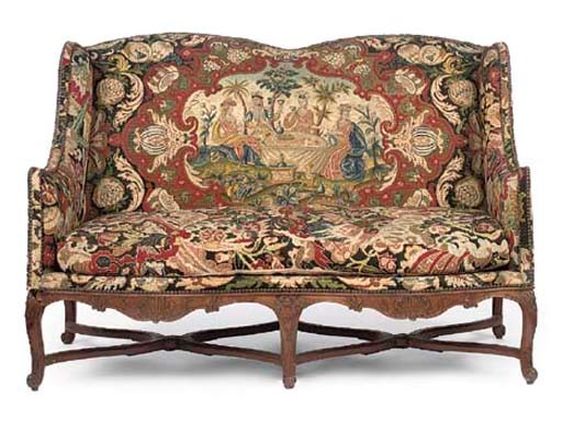 A REGENCE WALNUT SOFA