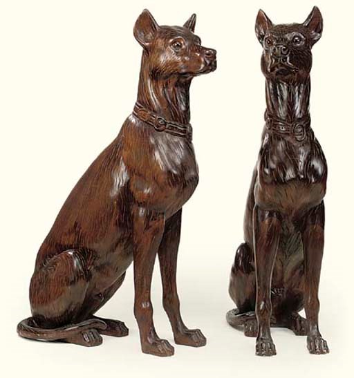A PAIR OF BEECH GUARD DOGS