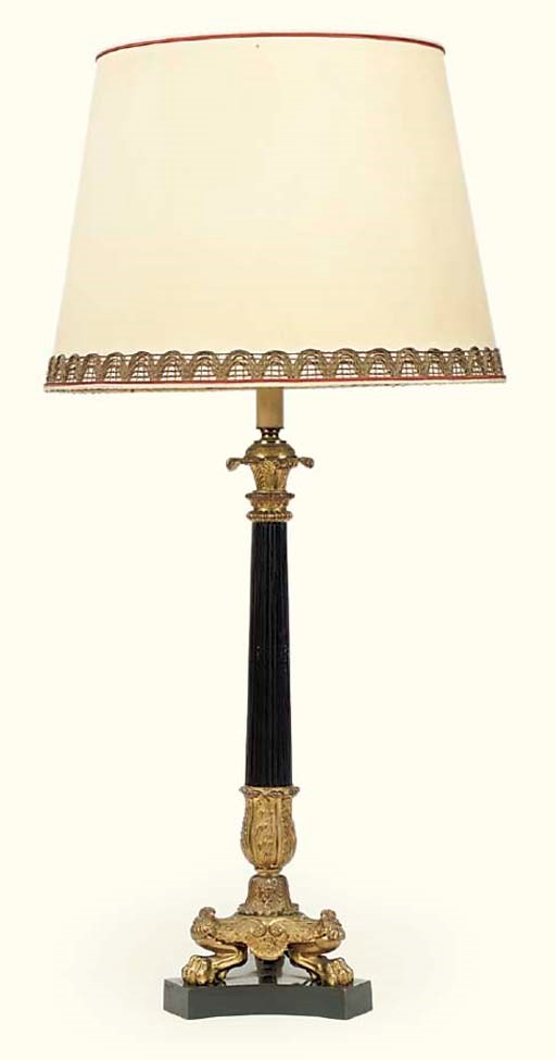 A BRONZE TABLE LAMP