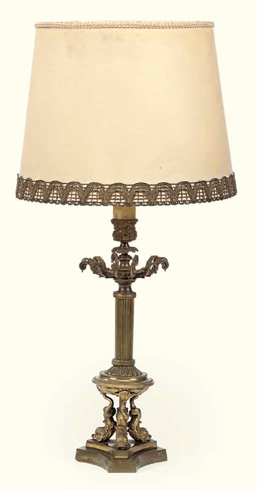A LATE EMPIRE GILT-BRONZE CANDLESTICK