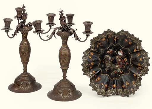 A PAIR OF INDIAN COPPER THREE-BRANCH CANDELABRA