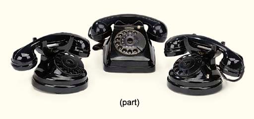 A PAIR OF ITALIAN BLACK PLASTIC TELEPHONES