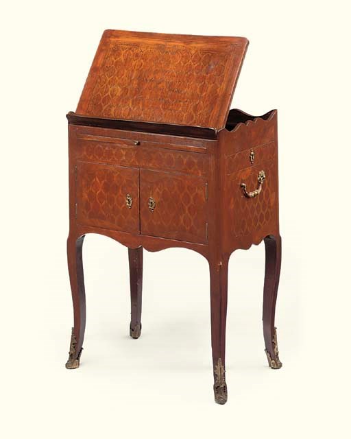 A FRENCH KINGWOOD AND PARQUETRY TABLE A ECRIRE