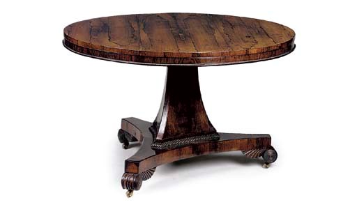 A REGENCY ROSEWOOD BREAKFAST TABLE