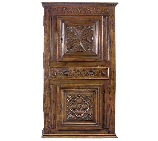 A FRENCH PROVINCIAL OAK WALNUT AND CHESTNUT CUPBOARD