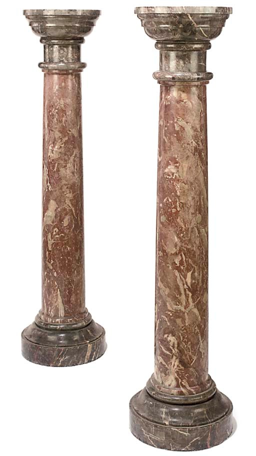 A PAIR OF MARMO ROSSO AND BLACK VARIGATED MARBLE PEDESTAL COLUMNS