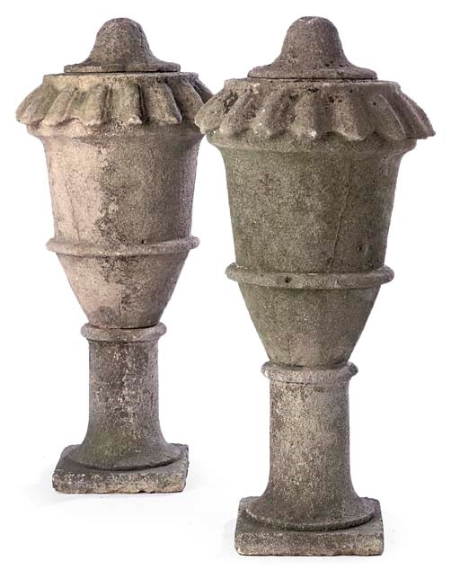 A PAIR OF CARVED VICENZA STONE URNS