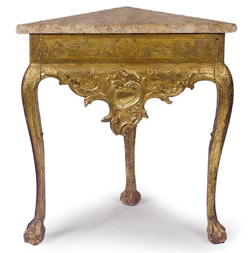 AN ITALIAN GILTWOOD CORNER CONSOLE TABLE