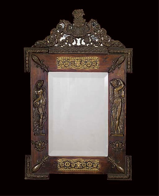 A NORTHERN EUROPEAN BRASS MOUNTED FRUITWOOD MIRROR
