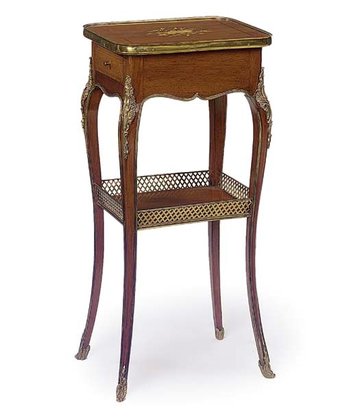A FRENCH MAHOGANY AND GILT METAL MOUNTED TABLE AMBULANTE
