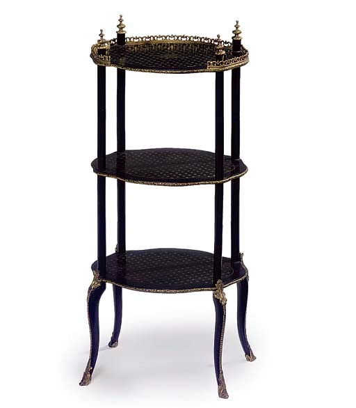 A LATE VICTORIAN GILT METAL MOUNTED AND EBONISED ETAGERE