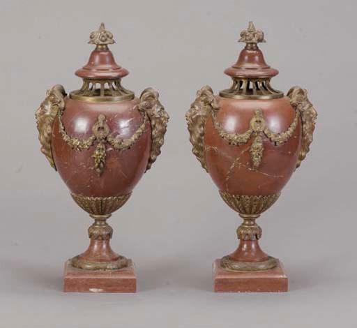 A PAIR OF GILT-BRONZE MOUNTED ROUGE MARBLE LIDDED URNS,