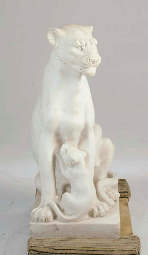 A CARVED WHITE MARBLE FIGURAL GROUP OF A LIONESS WITH HER CUBS,