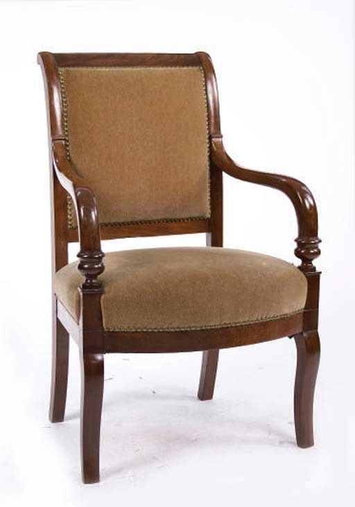 AN EMPIRE MAHOGANY FAUTUEIL COVERED IN TAUPE VELVET,