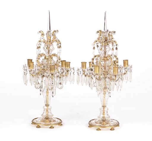 A PAIR OF CUT-GLASS AND GILT-BRONZE SIX LIGHT CANDELABRA,