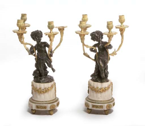 A PAIR OF FRENCH GILT AND PATINATED-BRONZE FOUR-LIGHT CANDELABRA,