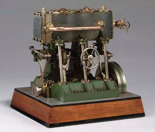 A well engineered model twin cylinder compound vertical reversing marine engine,