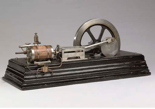 A well engineered single cylinder horizontal reversing stationary engine,