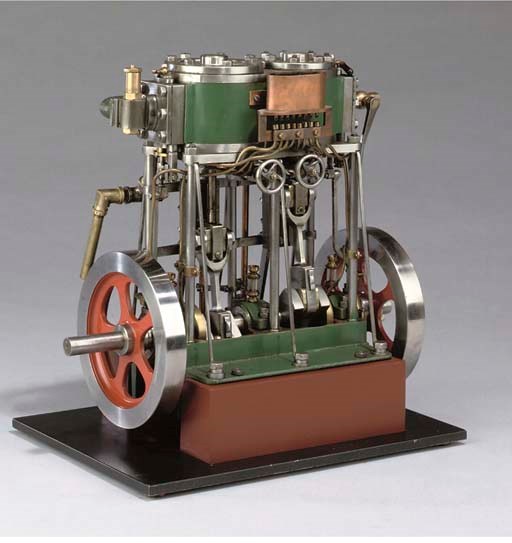 A finely engineered model twin cylinder compound six pillar vertical stationary engine,