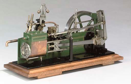 A well engineered model single cylinder horizontal reversing stationary engine,