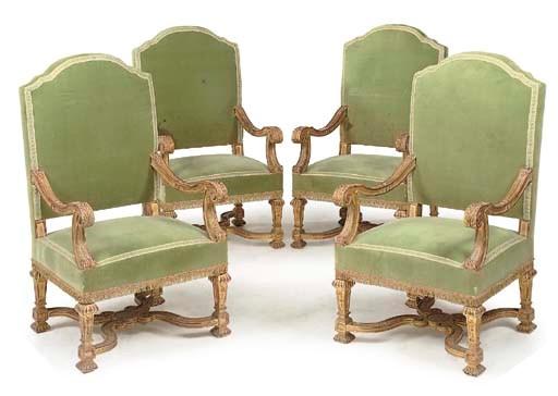 A SET OF FOUR ROYAL PALACE GILTWOOD ARMCHAIRS