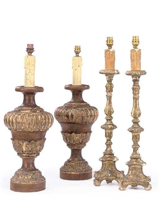 A PAIR OF ITALIAN CARVED WALNUT AND PARCEL-GILT ALTAR LAMPS