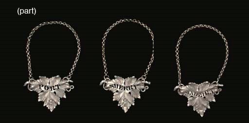 A SET OF FIVE VICTORIAN SILVER WINE-LABELS