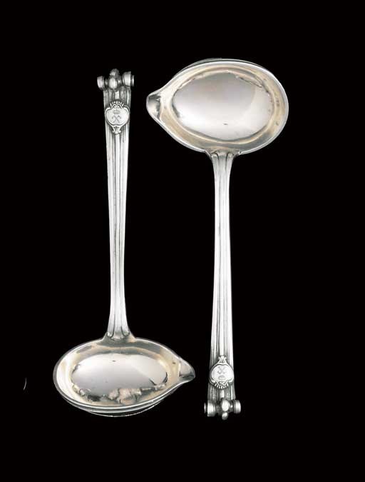 A PAIR OF DANISH SILVER SAUCE-LADLES