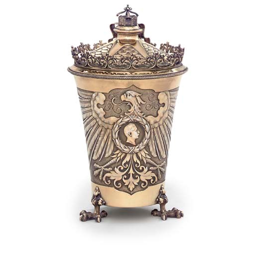 A GERMAN SILVER-GILT CUP AND COVER