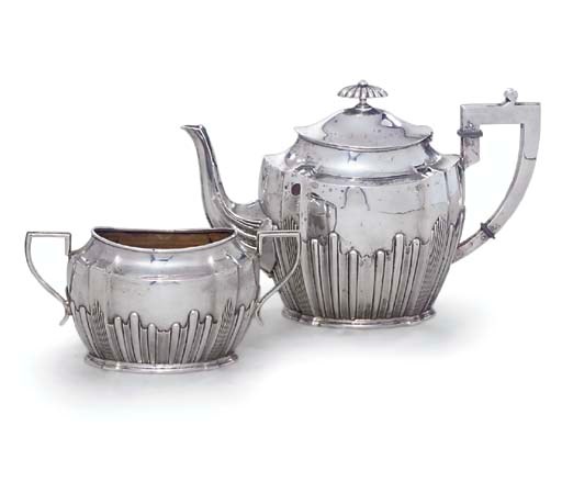 A GERMAN SILVER TEAPOT AND SUGAR-BOWL