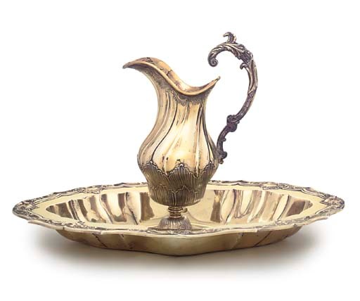 A PORTUGUESE SILVER-GILT EWER AND BASIN
