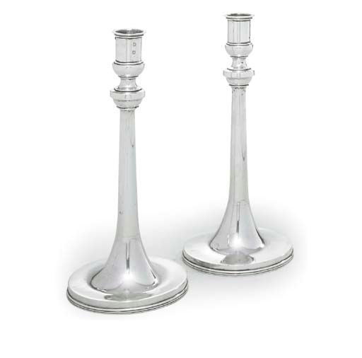 A PAIR OF CONTINENTAL SILVER CANDLESTICKS