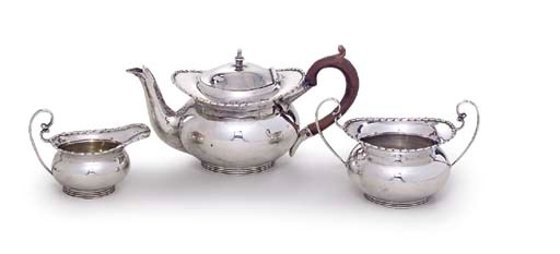 A EDWARD VII SILVER THREE-PIECE BACHELOR'S TEA-SERVICE