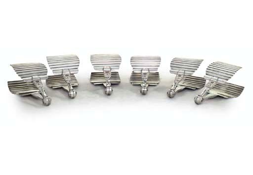 FOUR FRENCH SILVER PLATED SANDWICH TONGS