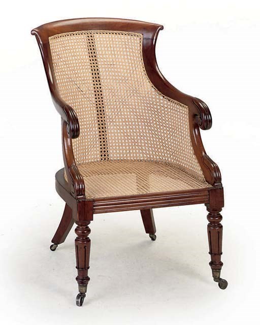 A WILLIAM IV MAHOGANY CANED BERGERE