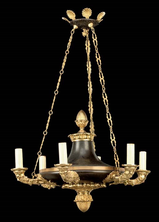 A GILT AND PATNATED BRONZE SIX-LIGHT CHANDELIER