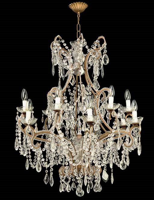 A GLASS MOUNTED GILT LACQUERED METAL TWELVE-LIGHT CHANDELIER